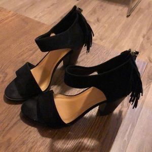 Black heels with tassels